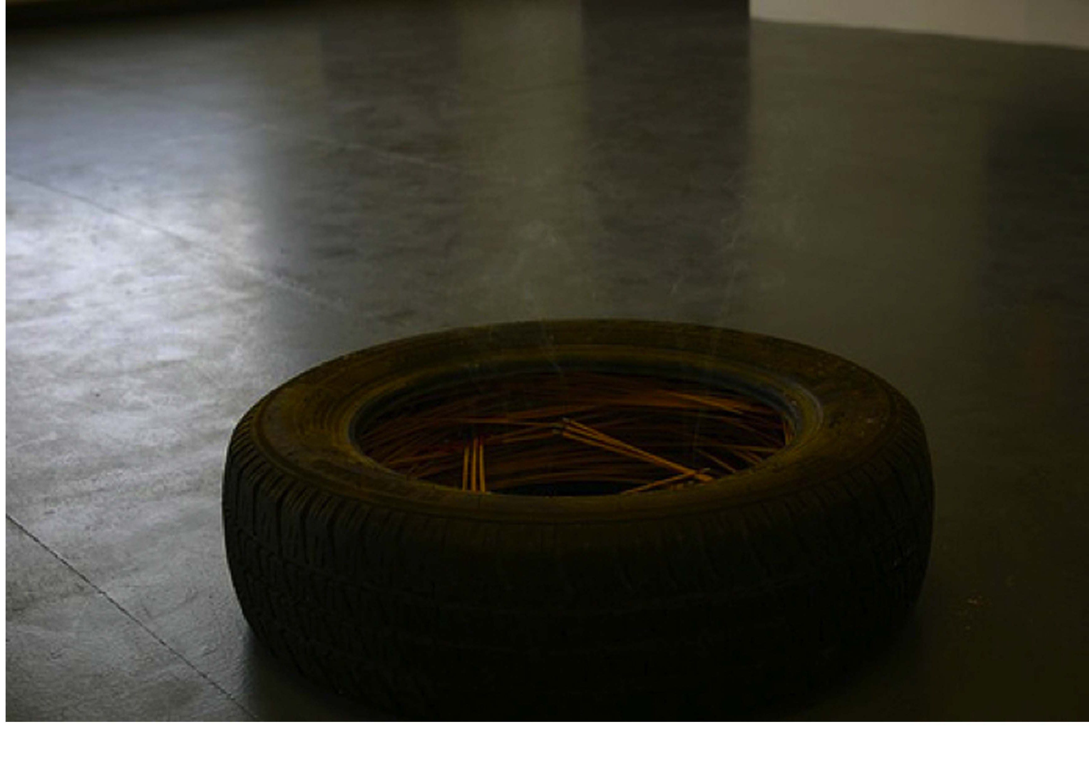 Eva Rothschild, Burning Tyre, Incense sticks, tyre, 2001