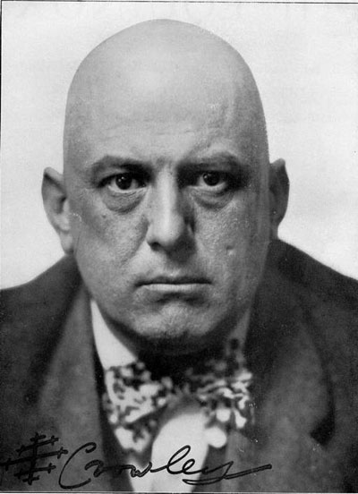 Aleister Crowley, age 37, author, hedonist, satanist, the wickedest man in the world, STDs, Golden Dawn, cults, occult, Thlemic, close-up, face - HeadStuff.org