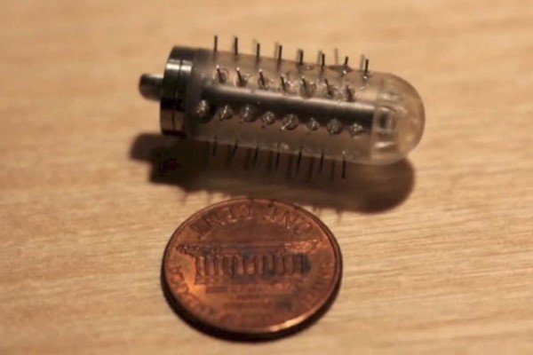 Microneedle picture, small size, compared to a one cent coin, microinjection, new way to deliver medicine - HeadStuff.org