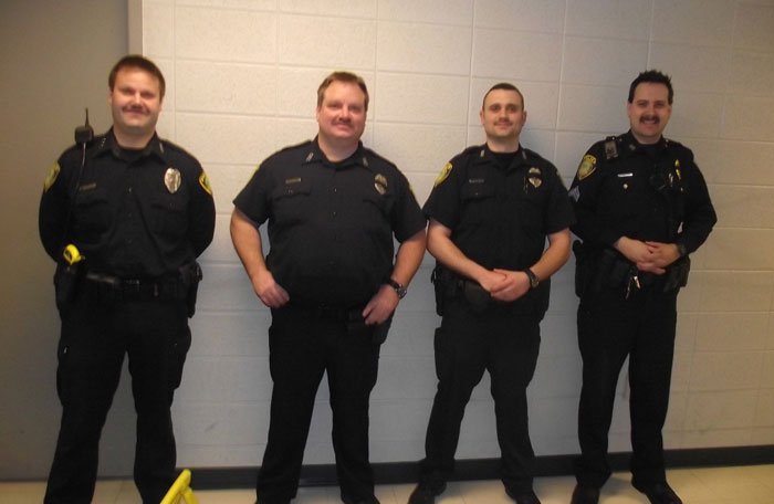 Officers of the Village of Greendale police department in Wisconsin show off their facial hair, moustache, history of cops with moustaches, movember, police tache - HeadStuff.org