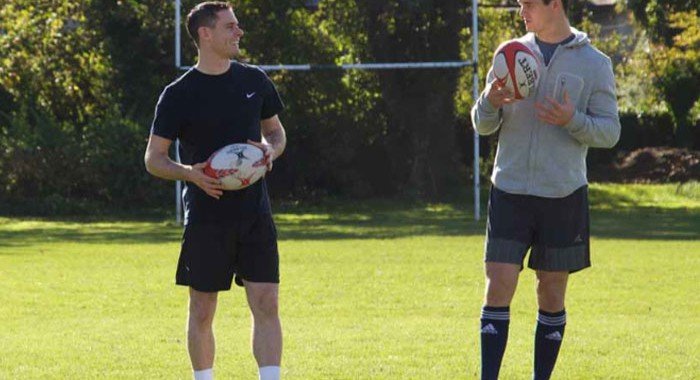 Johnny Sexton and Stephen Cluxton kicking balls on a pitch for Toyota in #whatdrivesyou ad campaign on HeadStuff.org