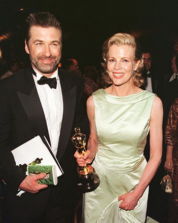 Alec Baldwin & Kim Basinger at the 70th Annual Academy Awards. Photo by Vince Bucci/AFP/Getty Images