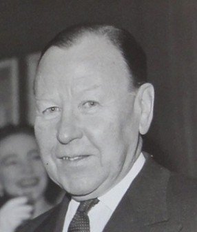 Black and white photo of Dudley Clarke as an older man - headstuff.org