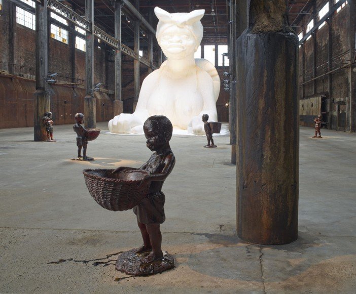 Kara Walker, A Subtlety, or the Marvelous Sugar Baby, an Homage to the unpaid and overworked Artisans who have refined our Sweet tastes from the cane fields to the Kitchens of the New World on the Occasion of the demolition of the Domino Sugar Refining Plant-Headstuff.org