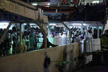 African migrants on boats off the coast of italy