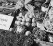 Crop of a photo of a greengrocer's stall during WW2 - headstuff.org