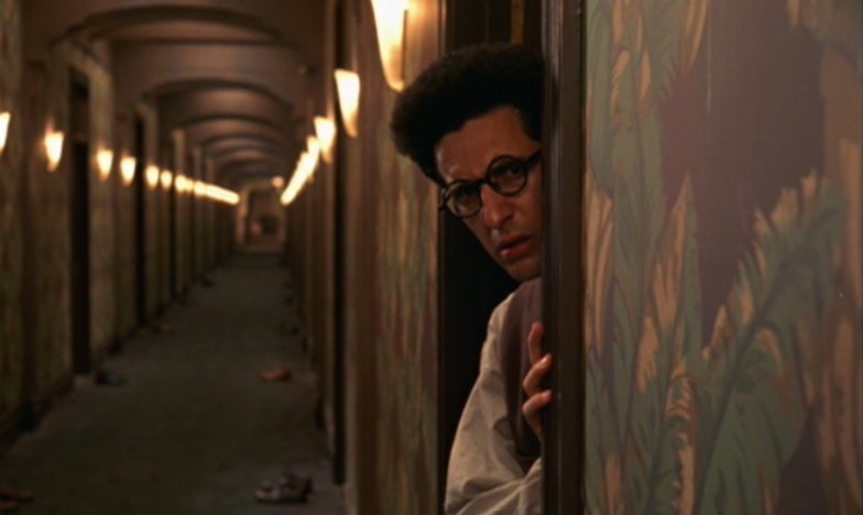 Barton Fink (Turturro) in the Hotel Earle - HeadStuff.org
