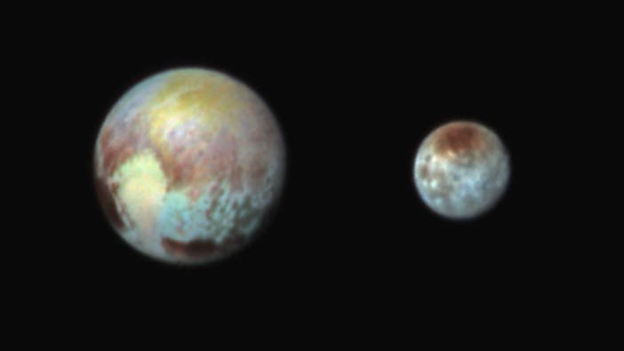 False Colour image of Pluto and Charon taken by New Horizons