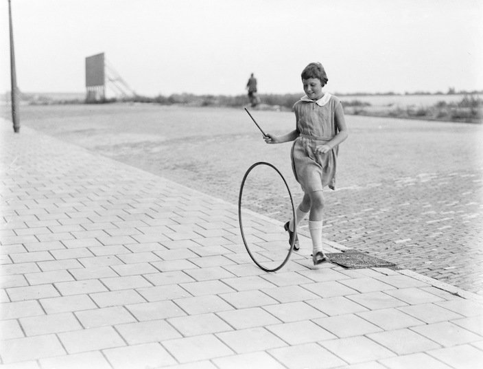 girl playing with hoop