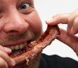 Man eats meat - HeadStuff.org
