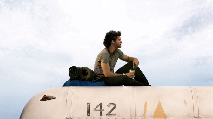 Emile Hirsch sits atop the famous Fairbanks Bus in Sean Penn's Into The Wild - HeadStuff.org