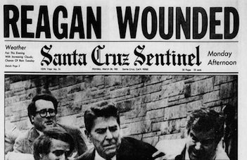 A newspaper's front page with a photo of the aftermath of the gun attack on President Reagan