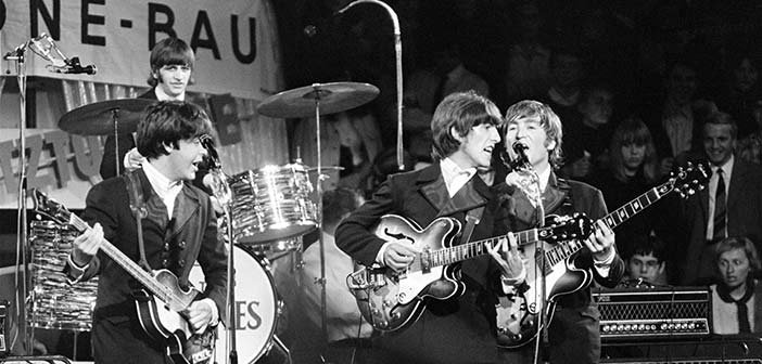 The Beatles playing live at the height of 'Beatlemania.' Source