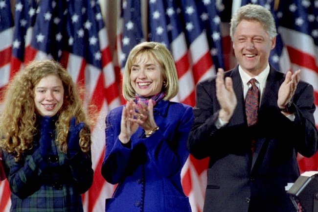 Chelsea, Hillary, and Bill Clinton clapping like in the Friends theme song