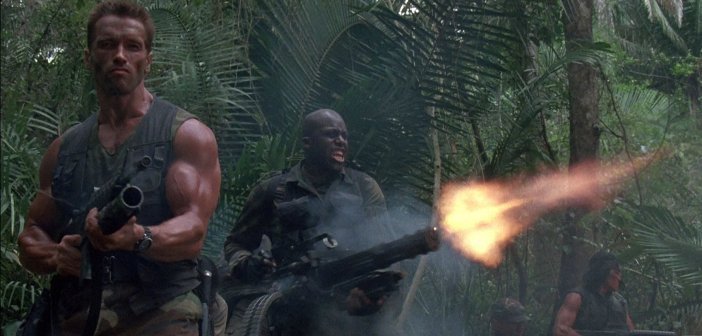 Arnold Schwarzenegger and Bill Duke in Predator. - HeadStuff.org