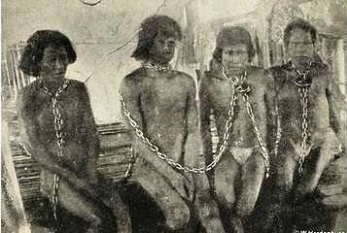 South American natives in chains - headstuff.org