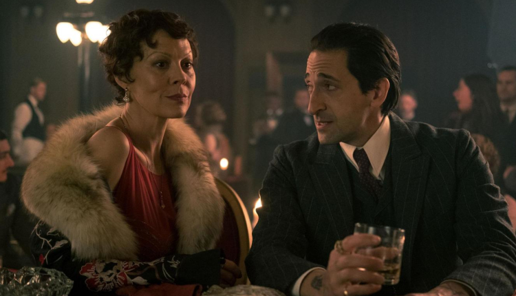 Helen McCrory as Polly Shelby and Adrien Brody as Luca Changretta in Peaky Blinders. - HeadStuff.org