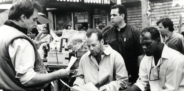 McTiernan (left) with Willis and Jackson on the set of Die Hard With A Vengeance. - Headstuff.org