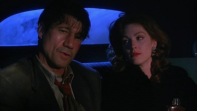 Fred Ward and Julianne Moore in Cast A Deadly Spell