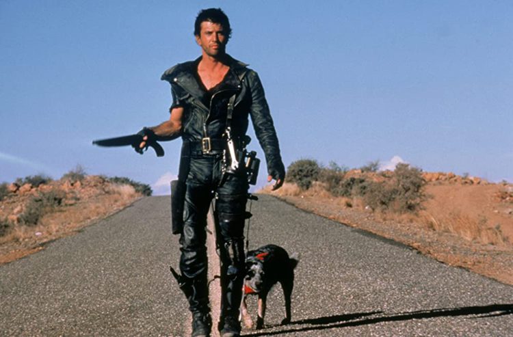 Mel Gibson and dog in Mad Max 2 - headstuff'rog