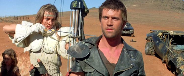 Virginia Hey and Mel Gibson in Mad Max 2 - headstuff.org